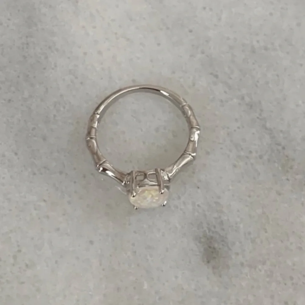 Silver Bamboo Opal Pendant Ring Size 6

Brand New - Picture 4 of 5